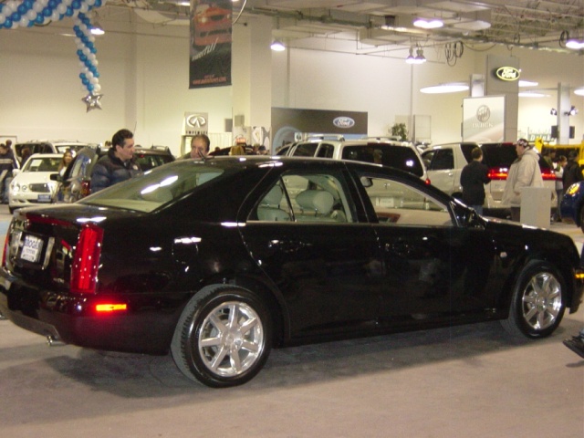 black-cadillac-sts-side-view